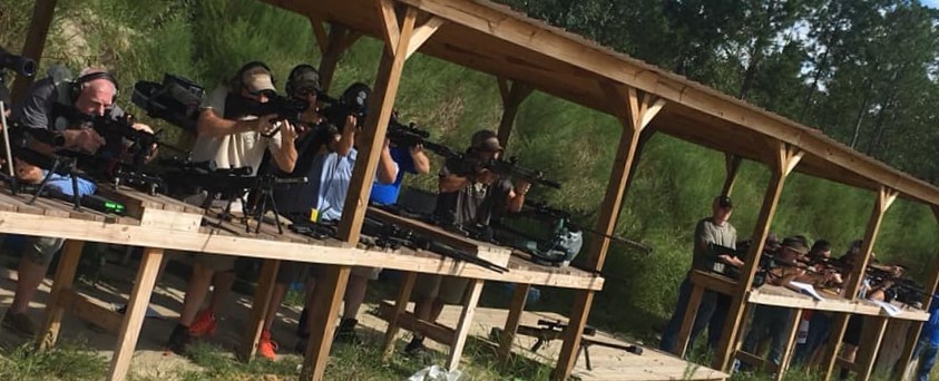 Shooters on the covered firing line at Sportsman's Corner